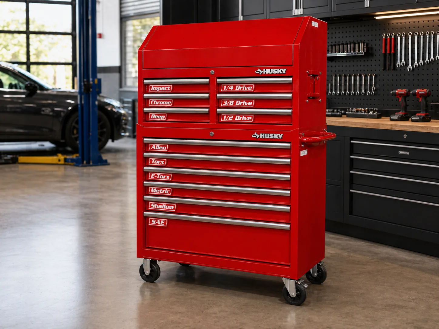 Red Husky rolling chest in a garage with VoltariTek socket labels organized across every drawer
