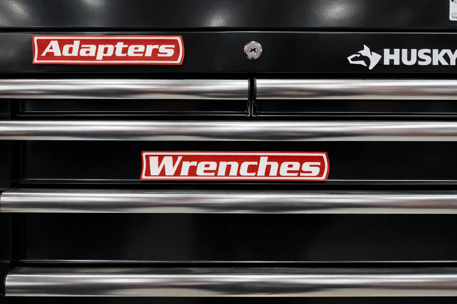 VoltariTek Adapters and Wrenches labels mounted on a real black Husky toolchest